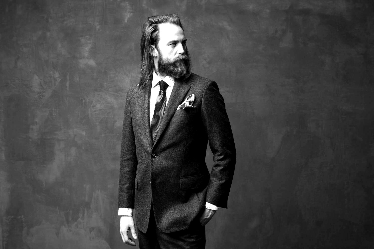 Oliver B Walker in a suit